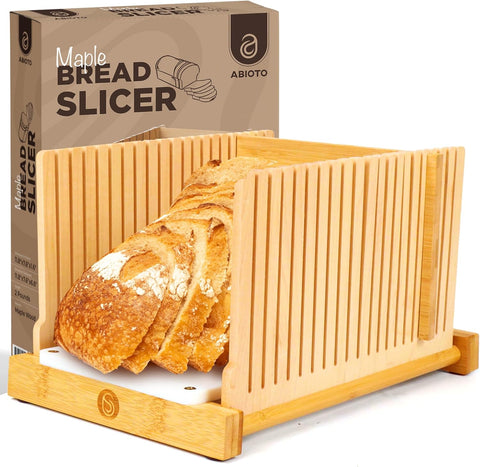 Maple Bread Slicer - 2024 Updated Design showcasing an adjustable bread slicer with homemade bread slices inside, perfect for even cutting.