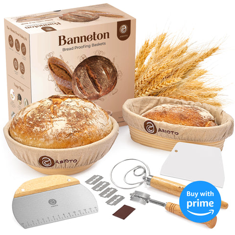 ABIOTO Bread Proofing Kit featuring rattan baskets, a Danish whisk, a bread lame with blades, and dough scrapers, ideal for baking enthusiasts.