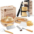 Complete Sourdough Bread Making Kit featuring ABIOTO's banneton bread proofing baskets, a glass sourdough starter jar, and essential baking tools.