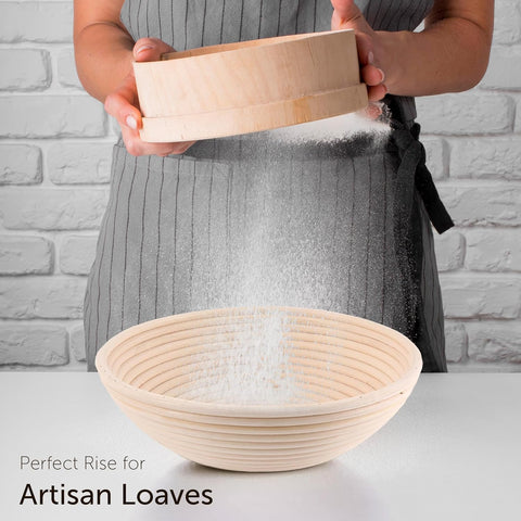 Baker dusting flour into ABIOTO's sourdough bread proofing baskets, designed for achieving the perfect rise.