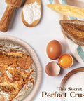 Artfully arranged ingredients around a freshly baked loaf in ABIOTO's sourdough bread proofing baskets.
